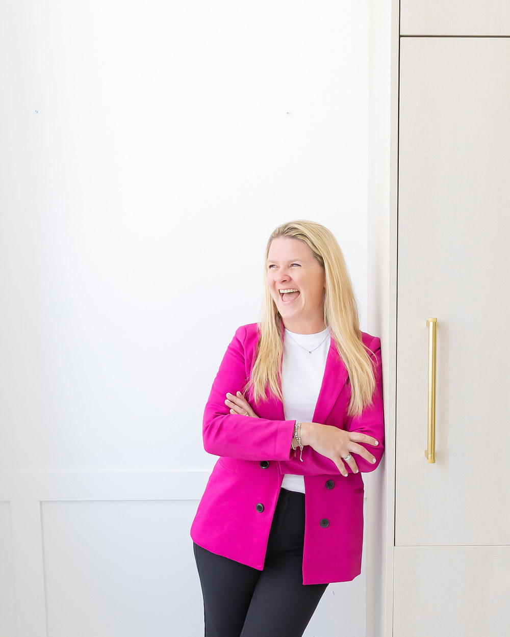 Sarah Claydon in a pink blazer